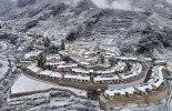 新春走基层·走笔｜雪夜再宿新华村